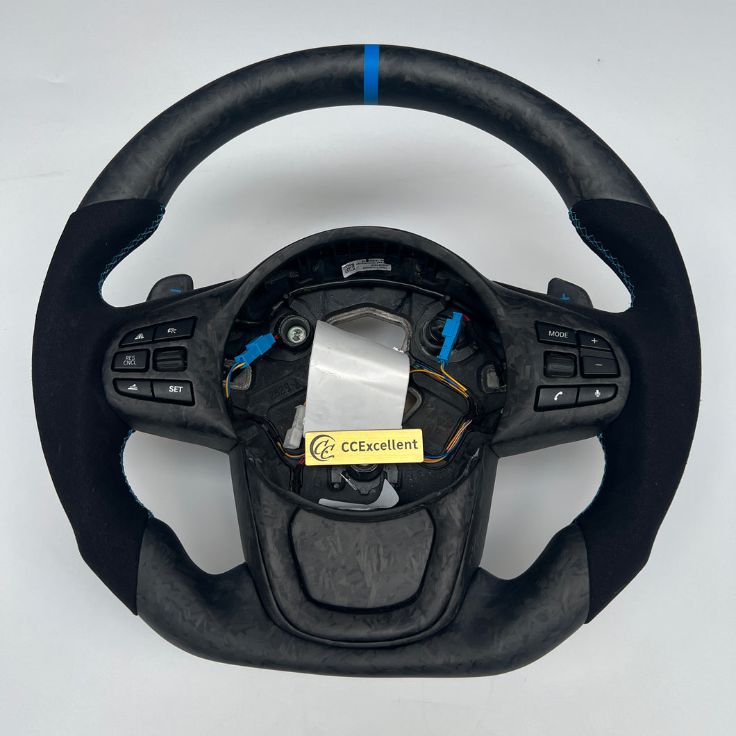 CCexcellent For Toyota Supra A90 carbon fiber steering wheel with alcantara sides