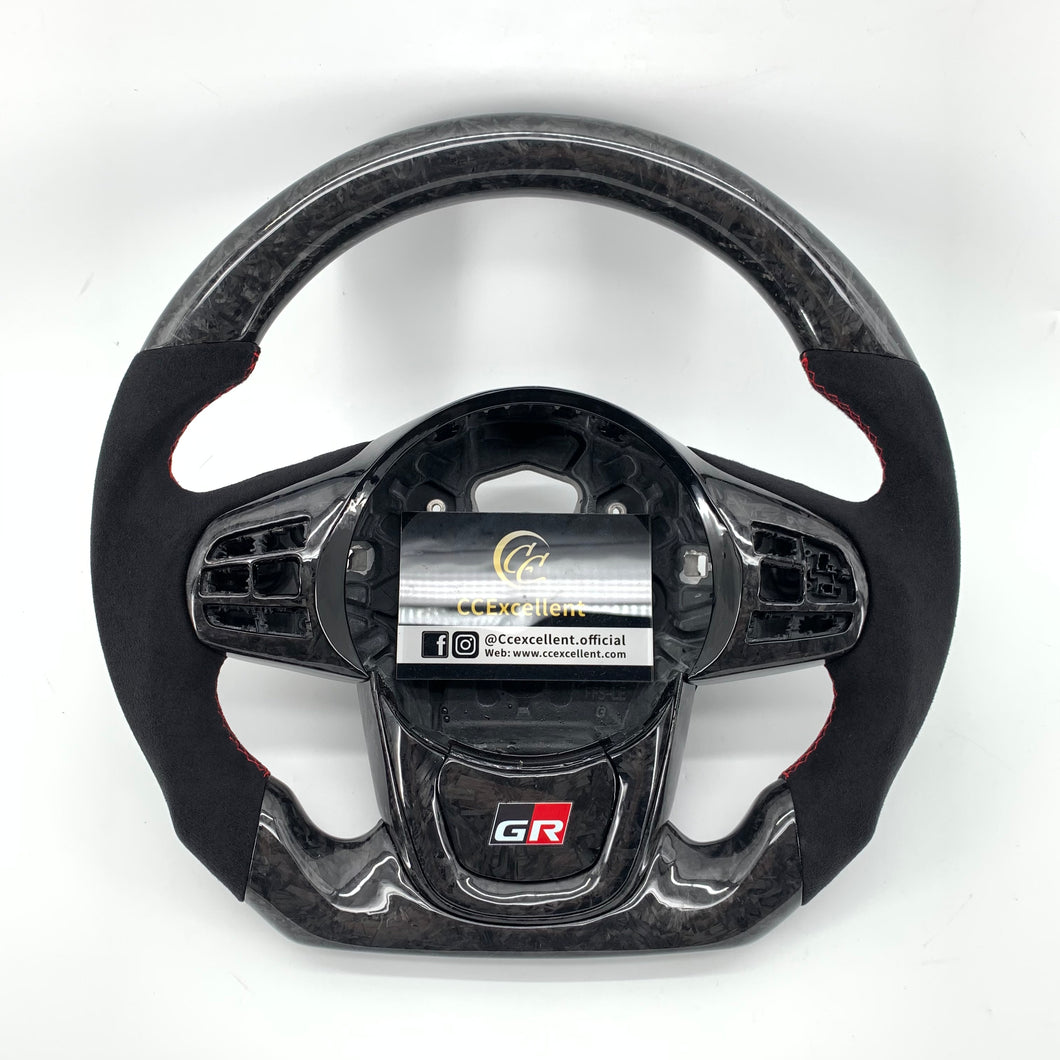 CCexcellent For Toyota Supra A90 carbon fiber steering wheel with alcantara sides